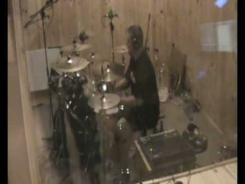 Grzelo plays drums