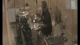 Grzelo plays drums