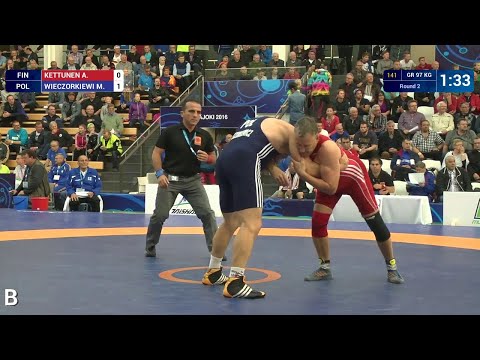 Round 2 GR - 97 kg: M. WIECZORKIEWI (POL) df. A. KETTUNEN (FIN), 6-2
