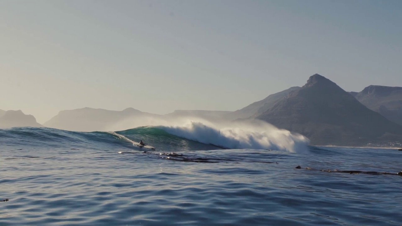 Surfski riding massive waves (short clip, film and edit by Rick Wall Films)