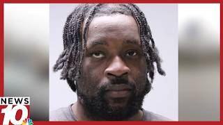 The Latest: Person charged with murder after missing man found dead in Geneva motel room