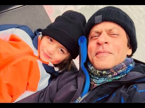 ছেলেকে নিয়ে একান্তে ঘুরে বেড়াচ্ছেন শাহরুখ খান | Shahrukh Khan Snow Surfing with Son AbRam Khan 2018!
