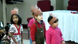 Aashish singing must be Santa at school Christmas party.