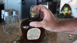 Removing Alpha store security alarm from whiskey liquor bottle bottles