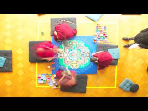 Monks of the Drepung Gomang Monastery create a sand mandala of the Buddha Amitayus