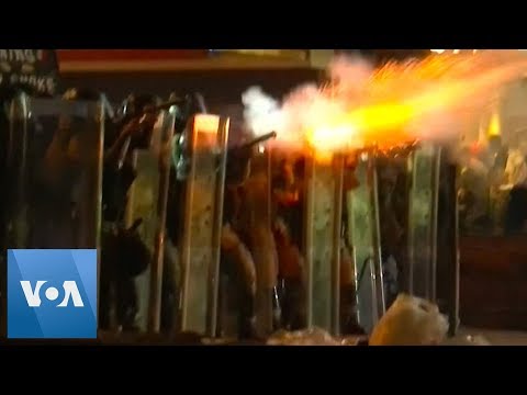 Hong Kong Riot Police Fire Tear Gas at Protesters