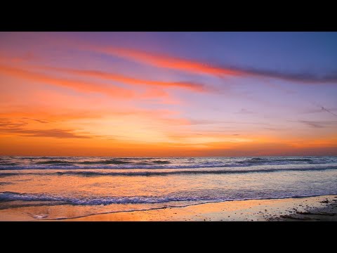 Gorgeous post-sunset glow on the beach and ocean waves - St. Pete Beach, Florida