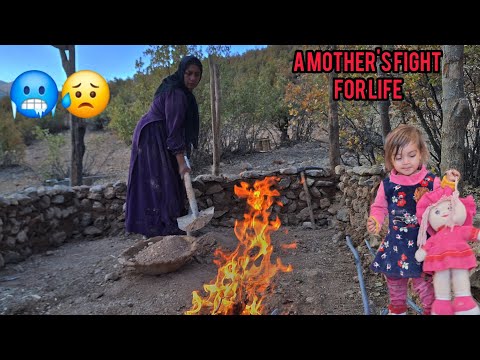 Homeless girl's mother's hut against rain and animals. Will it last?