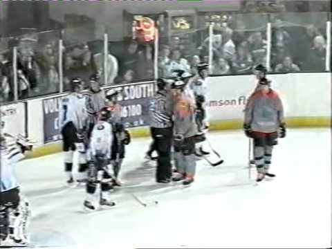 Jeff Christian shoves Pavol Mihalik In to the boards - EIHL 04-05