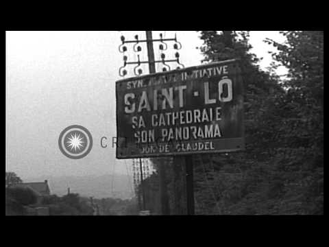 American soldiers of 35th Infantry Division enter and advance into St. Lo, France...HD Stock Footage