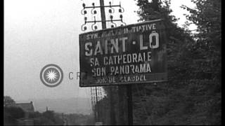 American soldiers of 35th Infantry Division enter and advance into St. Lo, France...HD Stock Footage