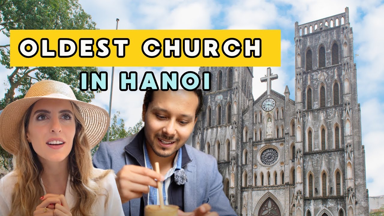 Two tourists flock to the captivating St. Joseph's Cathedral.