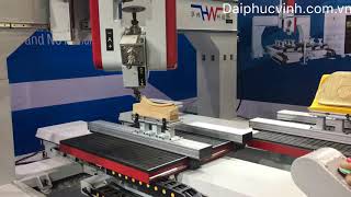 Máy gia công trung tâm 3D 5 trục axis 2 bàn ra vào tự đông
