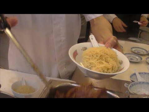 Hong Kong Food. Action in the Kitchen. Preparation of Noodles and Dumplings. Chinese Restaurant