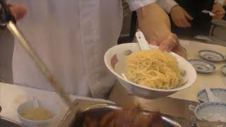 preview picture of video 'Hong Kong Food. Action in the Kitchen. Preparation of Noodles and Dumplings. Chinese Restaurant'