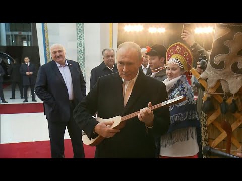 Video | Russia's Putin tries to play Kyrgyz folk instrument | AFP