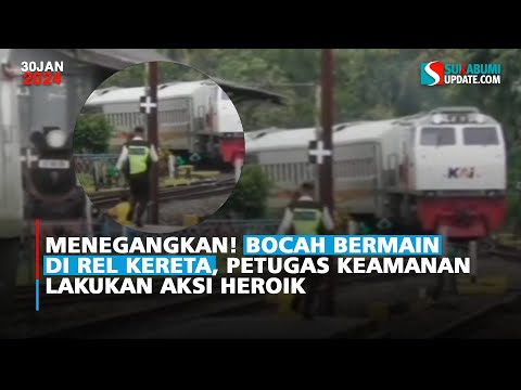 Menegangkan! Bocah Bermain di Rel Kereta, Petugas Keamanan Lakukan Aksi Heroik