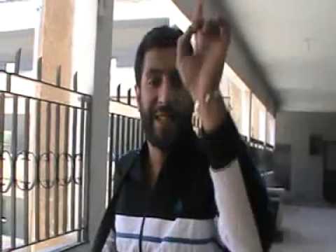 قصيدة يلقيها أحد مقاتلي الجيش الحر داخل حاجز ناصح في مدينة حماة بعد السيطرة عليه من قوات النظام