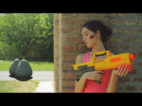 Nerf War : GIRL VS real life ZOMBIE POU LIKE CREATURES vfx action short film