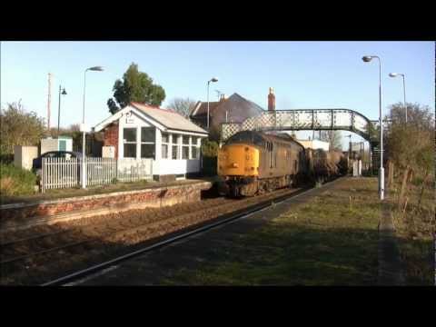 DRS 37510 and 37069 leaving Acle.wmv