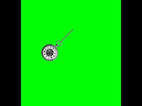 POCKET WATCH ON GREEN BACKGROUND