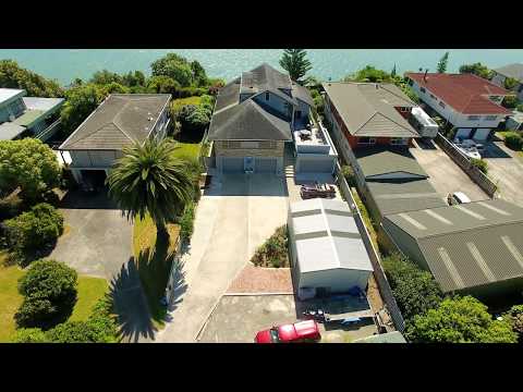 Magnificence in Maungatapu WITH 7 car garaging