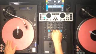 DJ Supafly mixing and scratching EDM Music