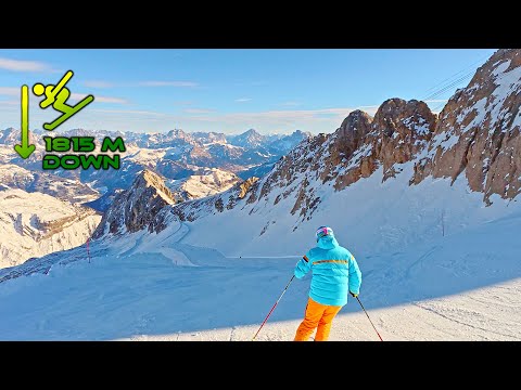 Skiing Marmolada Dolomites one of the largest skiing descent in Europe 8,5km 1815m down 3265-1450asl