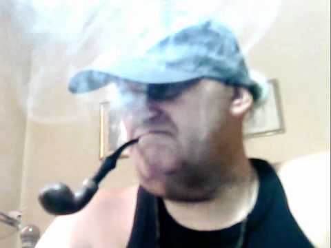 Pipe Tobaccos, Peterson's Dublin, Sterling, Silver, Smoker, of, with Black Hat; Black TShirt of Surf