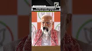 ‘Congress’ made false AI image of me in tea garden’ with Assamese sisters: PM Modi