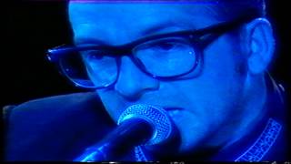 Elvis Costello/ Tramp The Dirt Down.