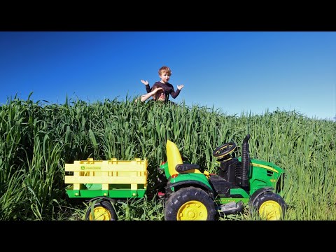 We lost our Power Wheels tractor in the grass | Tractors for kids on the farm adventure