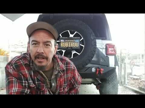 Poison Spyder rear bumper and tire carrier on Jeep JL.