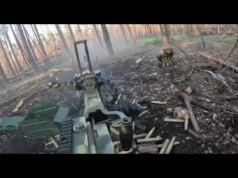 Ukraine - XX.09.2023. Ukrainian Soldier Fires Suppressive Fire With DShK Machine Gun During A Battle