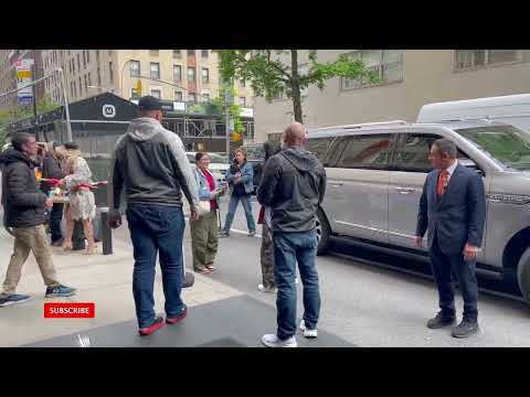 Dua Lipa greet her fans while arriving back at her hotel.