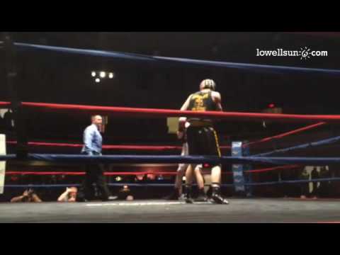 Nate Balakin of #Tyngsboro (blue) trades combos with Anthony Cefalo in a 141 Novice Golden Gloves bo