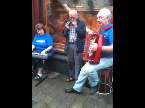 12 time All Ireland harmonica champion Noel Battle and friends at the Cavan Fleadh