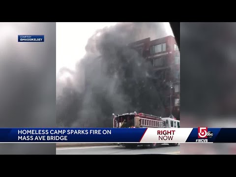 Mass Ave Bridge reopens after fire in homeless camp prompts inspections