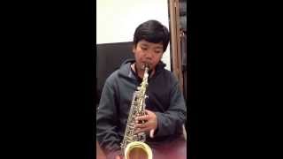 Dean practicing his alto sax and squeaks