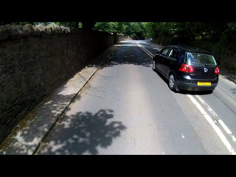 YH55CZV - Illegal overtake, on the phone
