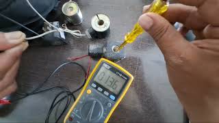 How do you test a solenoid with a multimeter?