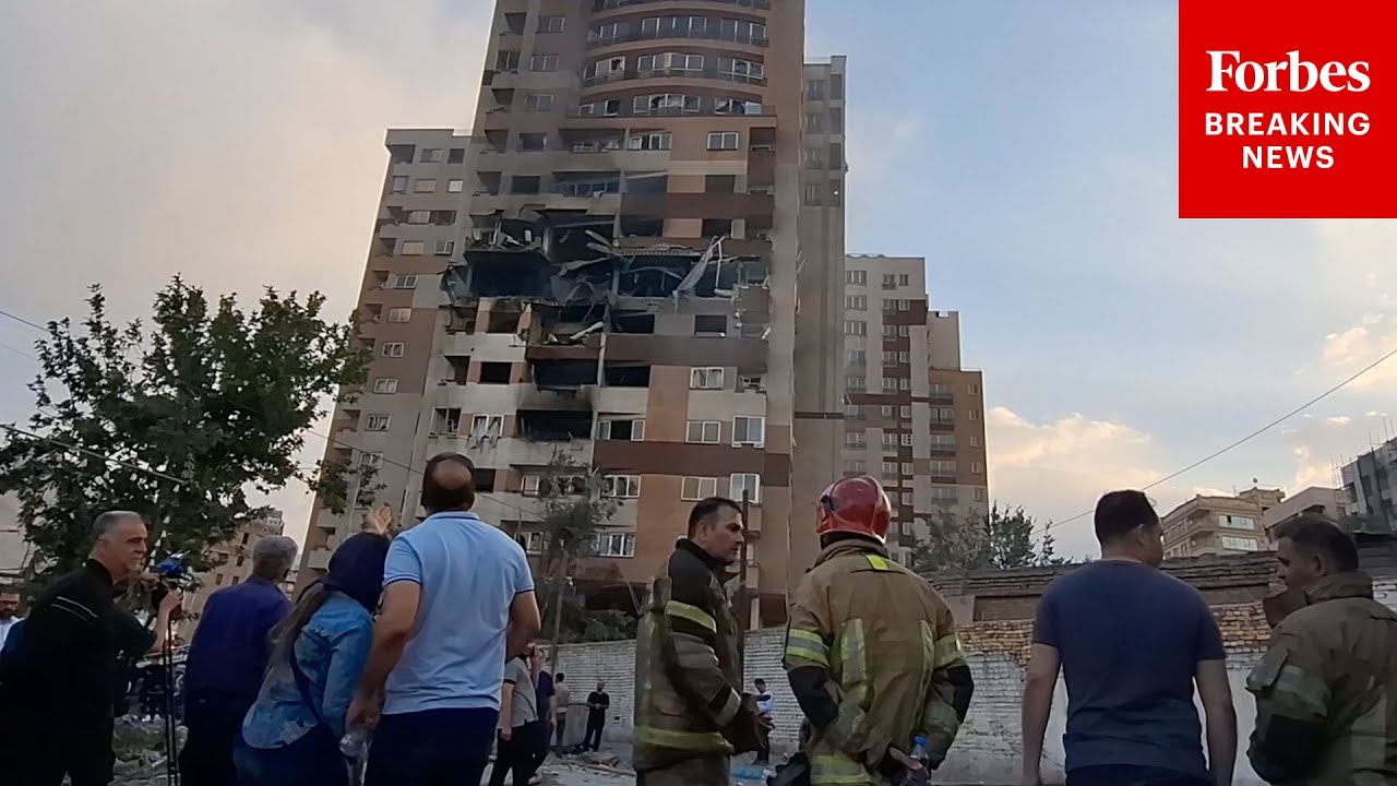 RAW FOOTAGE: People In Tehran, Iran, Look At Aftermath Of Israeli Strike On Building
