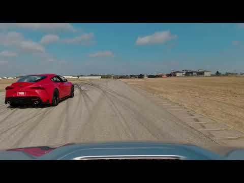 Thumbnail for Lexus passing the Supra at racetrack | Toyota of Irving in Dallas Fort Worth by Toyota Supra Lexus