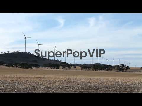 Long pan shot of row of windmills at Waterloo Wind Farm. ...