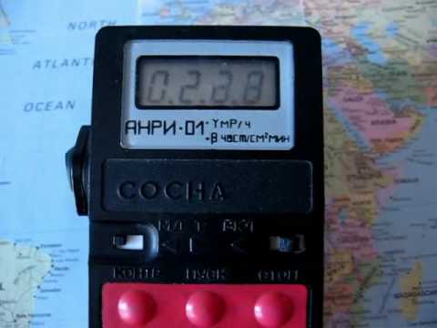 ANRI-01 SOSNA dosimeter on a pitchblende (uranium dioxide)