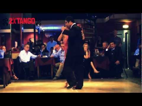 Jesica Arfenoni  and  Roberto Zuccarino  are  dancing  to  the  milonga  "  Por La Huella  "