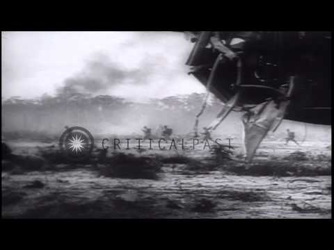 US infantry fights Japanese troops and capture a Japanese air base on Noemfoor is...HD Stock Footage