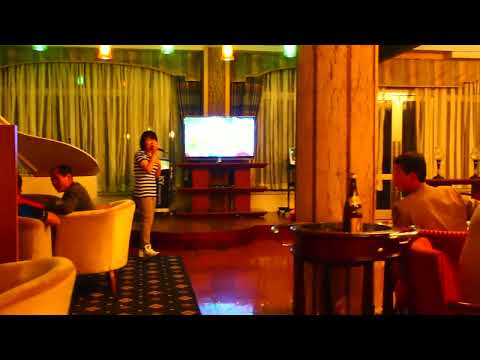 North Koreans singing in karaoke 2012