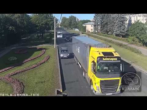 Car Gets Sandwiched Trying To Overtake Truck