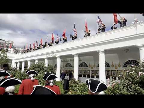 Watch: Xi and Trump review guard of honor at White House